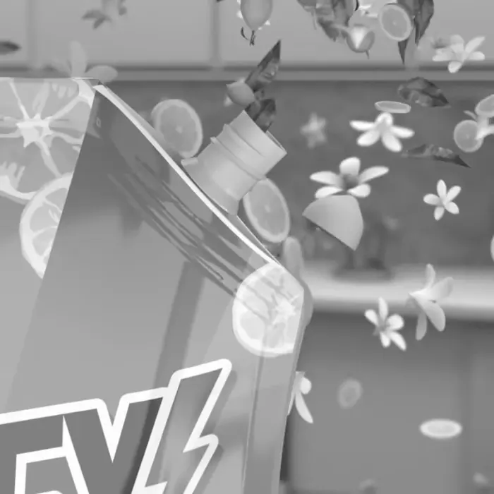 Producto de limpieza marca Tronex sin tapa y con muchos cítricos y flores a su alrededor